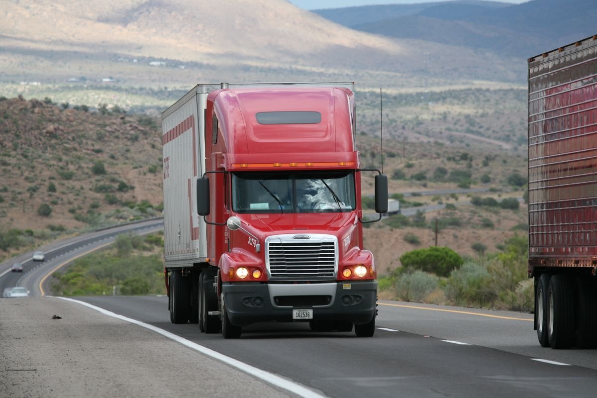 Dry van freight truck traveling on the highway